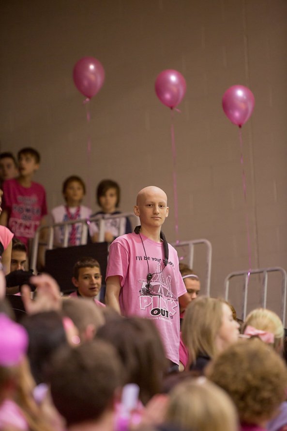 Cam McKinnon, JHS student who is fighting bone cancer and postponed his last chemo treatment on Friday to play in the PINK OUT Pep Band. An inspiring young man.